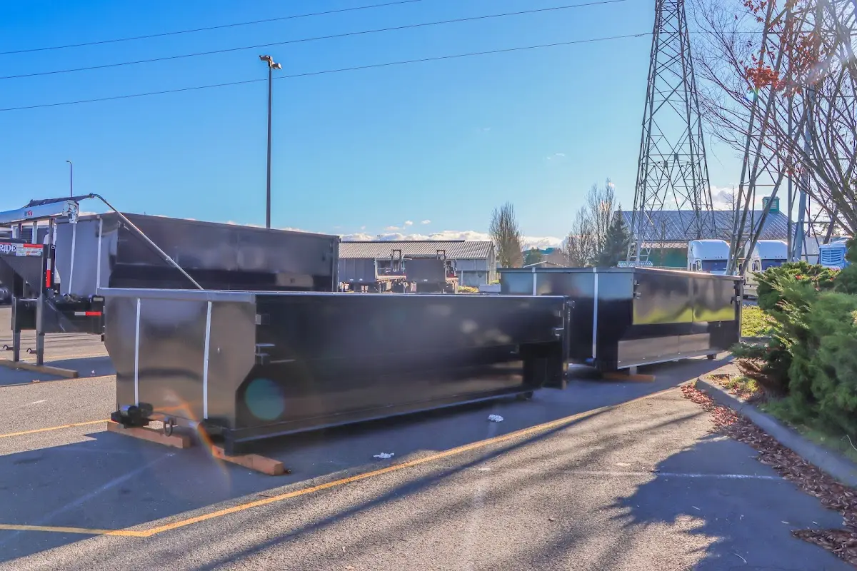 Roll-off dumpster ready for waste disposal at job site for 6 Yard Dumpster Rental in Jericho